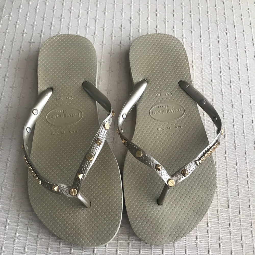 Gold and tan havaianas flip flop sandals
